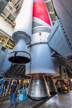 A GEM63XL is maneuvered into position for attachment to Vulcan. Photo by United Launch Alliance