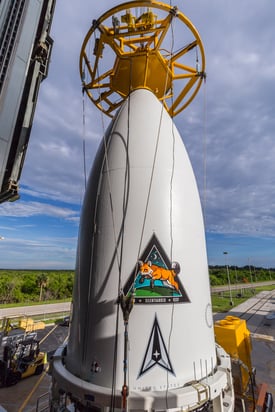 The encapsulated payload is prepared for lifting atop the Atlas V.  Photo by United Launch Alliance