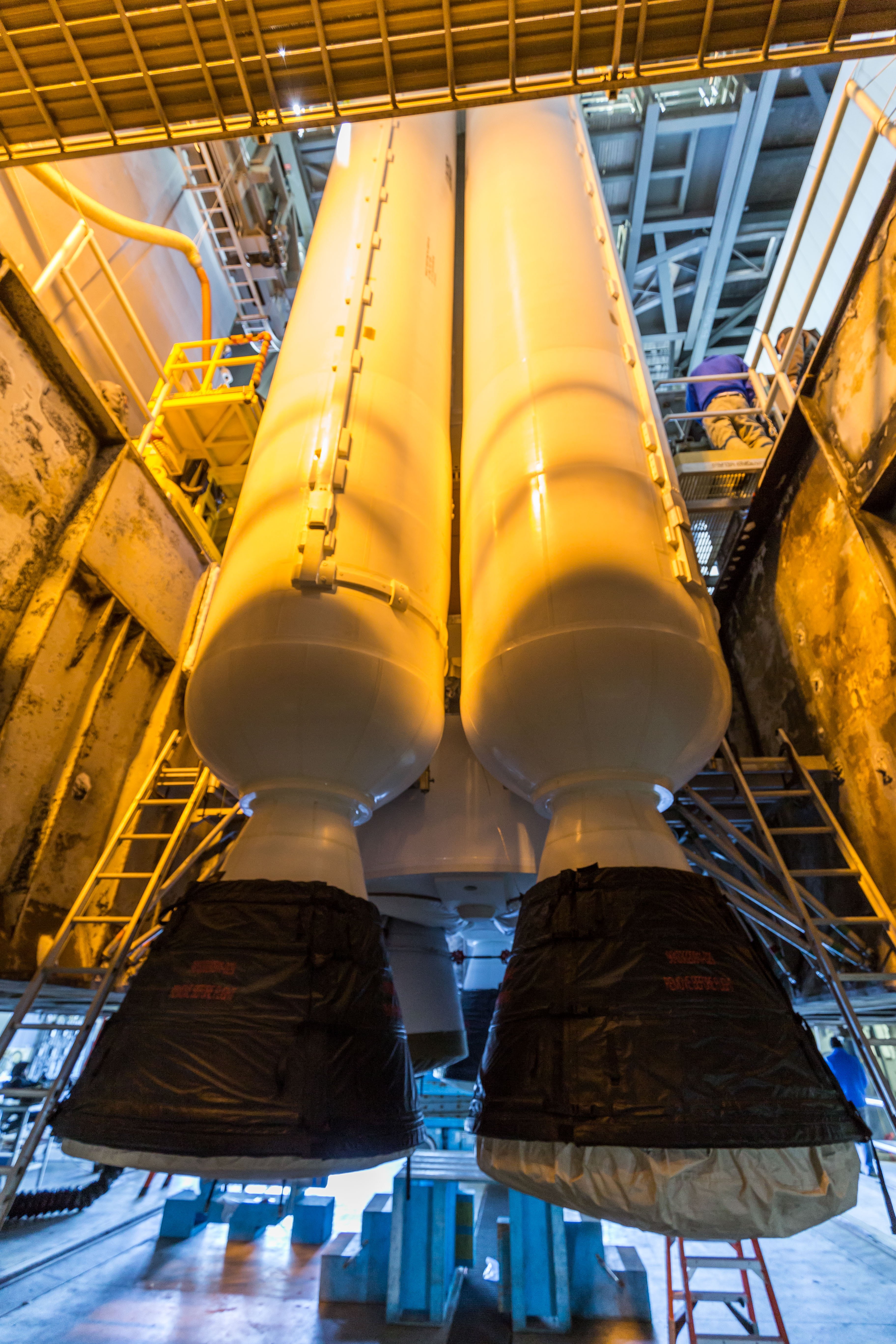 The solid rocket boosters were attached to the first stage during stacking operations. Photo by United Launch Alliance