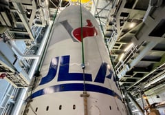 The encapsulated payload is hoisted into VIF-G. Photo by United Launch Alliance