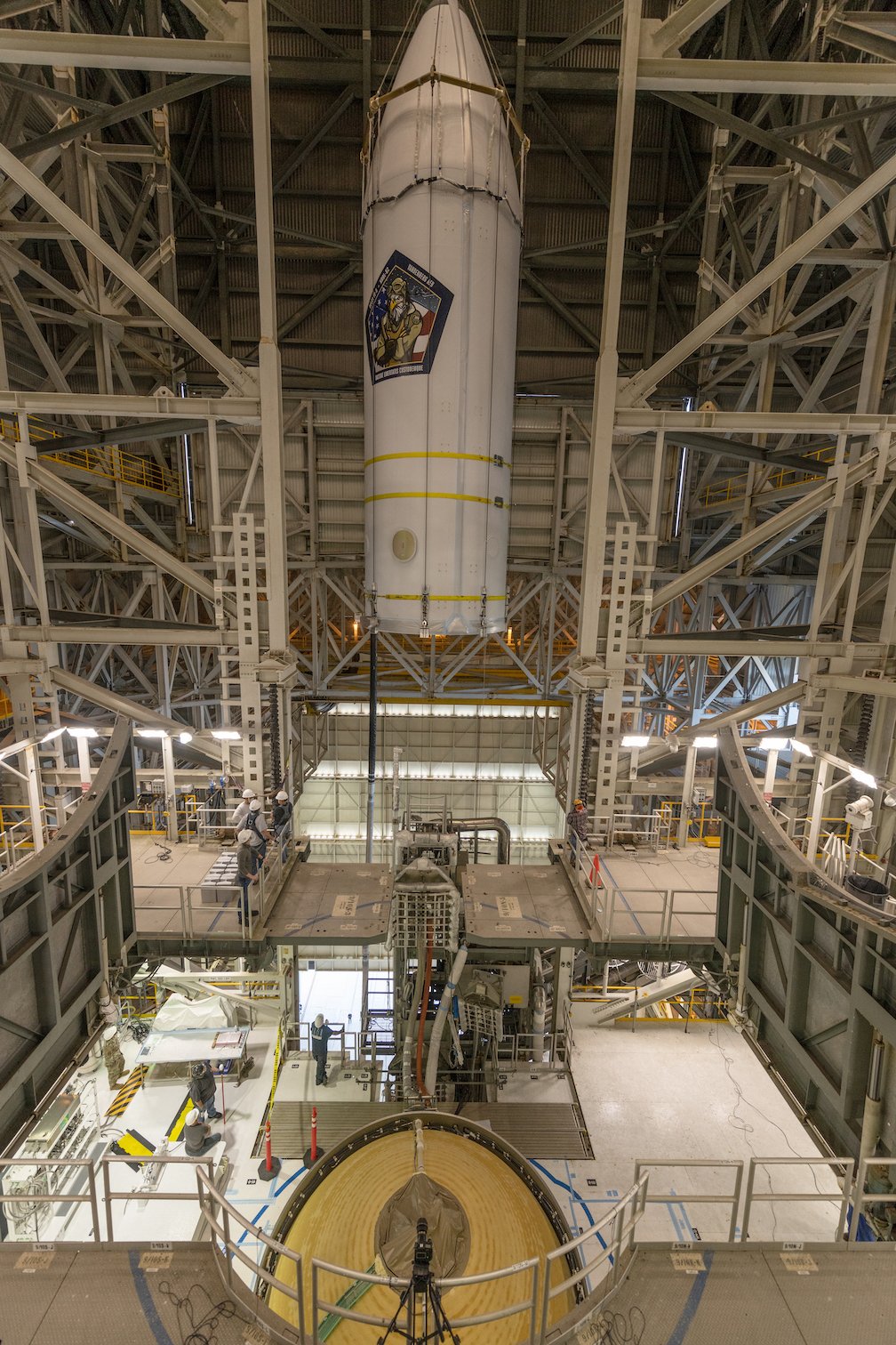 The NROL-82 payload is hoisted by crane to be mounted to the Delta IV Heavy rocket. Photo by United Launch Alliance 